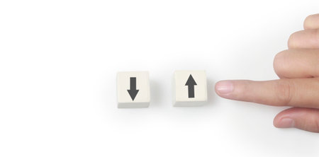 Concept creative idea and innovation. cube block in hand with symbolの写真素材