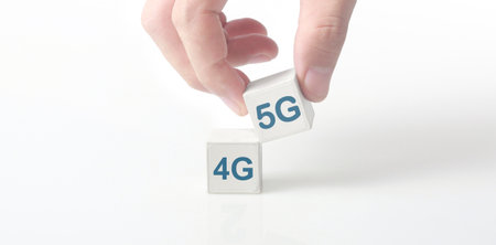 Concept creative idea and innovation. cube block in hand with symbolの写真素材