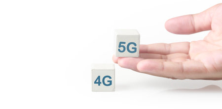 Concept creative idea and innovation. cube block in hand with symbolの写真素材