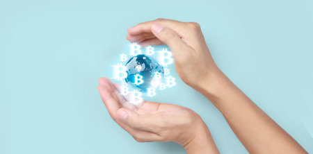 Hands showing bitcoin icon as virtual money on digital