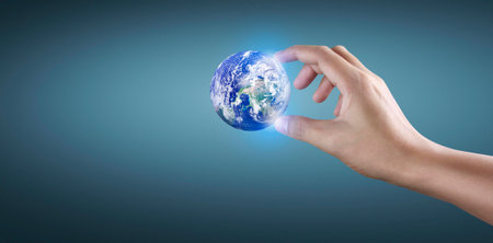 Globe in hand, Earth energy saving concept