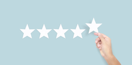 Hand of touching rise on increasing five stars. Increase rating evaluation and classification...