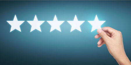 Hand of touching rise on increasing five stars. Increase rating evaluation and classification...