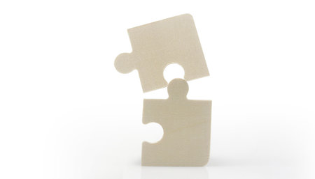 Connecting jigsaw puzzle in a hand. Business solutions success and strategy conceptの写真素材