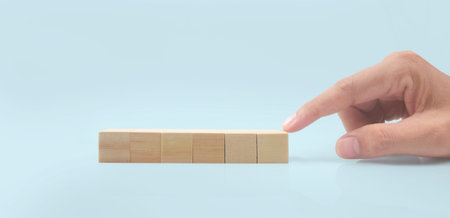 Wooden blocks chart steps with copy spaceの写真素材