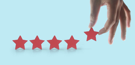Rise on increasing five stars in human hand, Increase rating evaluation classification concept