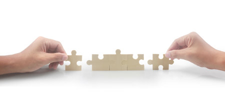 Connecting jigsaw puzzle. Business solutions success and strategy conceptの写真素材