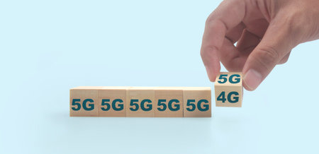 Wooden blocks chart steps in hand with copy space and word decideの写真素材