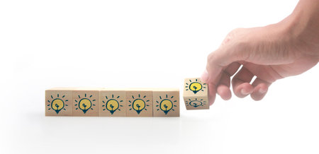 Wooden blocks chart steps in hand with copy space and word decide