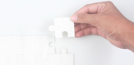 Connecting jigsaw puzzle. Business solutions success and strategy conceptの写真素材