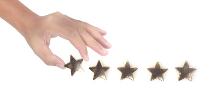 Rise on increasing five stars in human hand, Increase ratingの写真素材