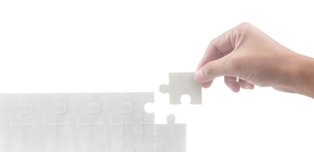 Connecting jigsaw puzzle. Business solutions success and strategy conceptの写真素材