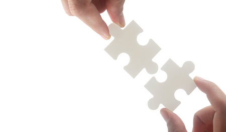 Connecting jigsaw puzzle. Business solutions success and strategy conceptの写真素材