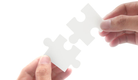 Connecting jigsaw puzzle. Business solutions success and strategy conceptの写真素材