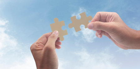 Connecting jigsaw puzzle. Business solutions success and strategy conceptの写真素材