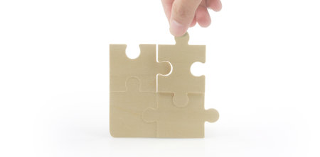 Connecting jigsaw puzzle. Business solutions success and strategy conceptの写真素材