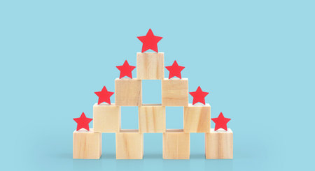 Wooden blocks with the five star symbol Increase rating, Customer experienceの写真素材