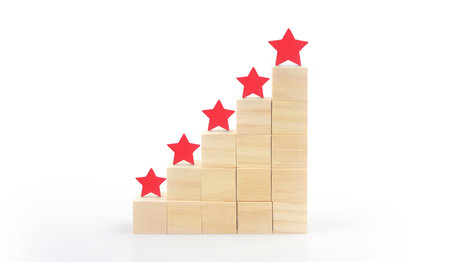 Wooden blocks with the five star symbol Increase rating, Customer experienceの写真素材