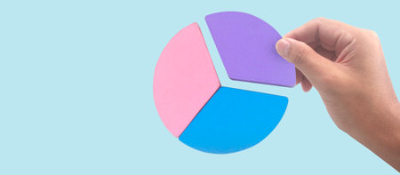 Hand touching graphs of financial indicator and accounting market economy analysis chartの写真素材