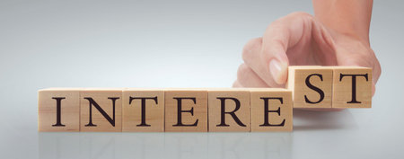 Wooden cubes in hand with copy space for input wording and infographic wordの写真素材