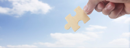 Connecting jigsaw puzzle. Business solutions success and strategy conceptの写真素材