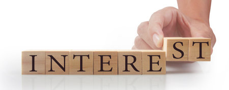 Wooden cubes in hand with copy space for input wording and infographic wordの写真素材