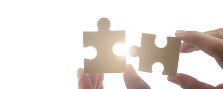 Connecting jigsaw puzzle. Business solutions success and strategy conceptの写真素材