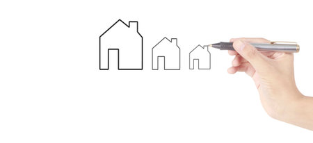 Male hand drawing house in whiteboard visualizationの写真素材