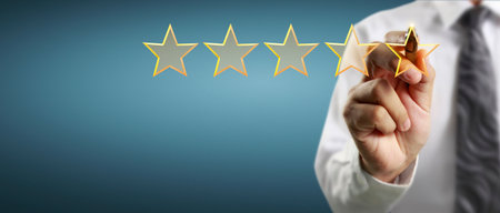 Rise on increasing five stars in human hand, Increase ratingの写真素材