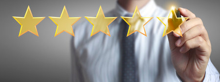 Rise on increasing five stars in human hand, Increase ratingの写真素材