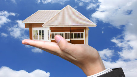 Business Idea house in human handsの写真素材