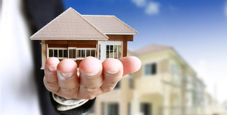 Business Idea house in human handsの写真素材