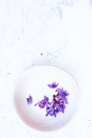 Purple flowers on a white background. Flat lay, top view.の写真素材