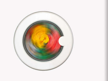 Colorful clothing in washing machineの写真素材