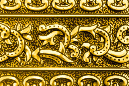 Pattern on yellow metal (retro textured background)の写真素材