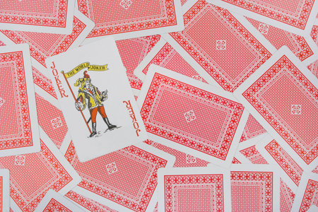 Joker on playing cards backgroundのeditorial素材