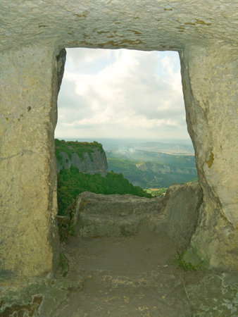 Window in stony wall, cave town, Crimeaの写真素材
