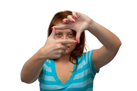 Girl looking through a frame, isolated on white background