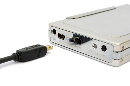 Computer hard drive and usb cable, isolated on white background