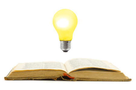 Retro book and lamp, isolated on white background
