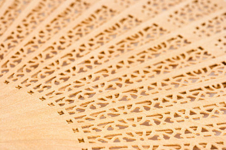 Macro of wood chinese fan, abstract background
