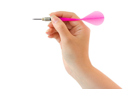 Arrow darts in hand isolated on white backgroundの写真素材