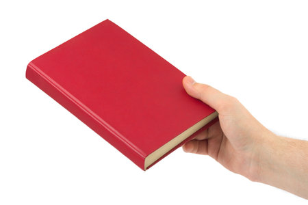 Book in hand isolated on white backgroundの写真素材