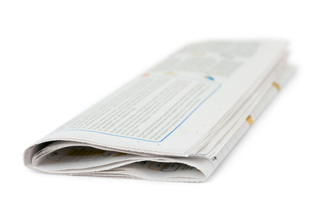 Newspaper isolated on white backgroundの写真素材