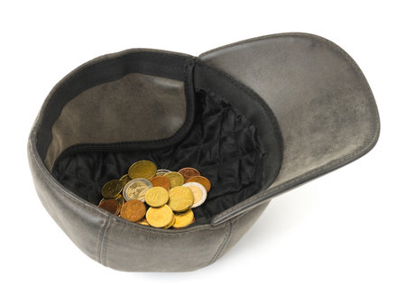 Hat with money isolated on white backgroundの写真素材