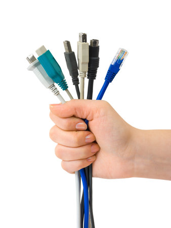 Computer cables in hand isolated on white background
