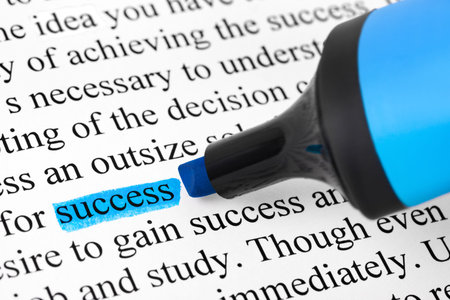 Highlighter and word success - concept business backgroundの写真素材