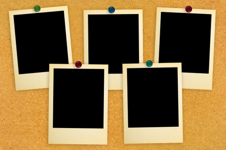 Retro photo cards on wood background
