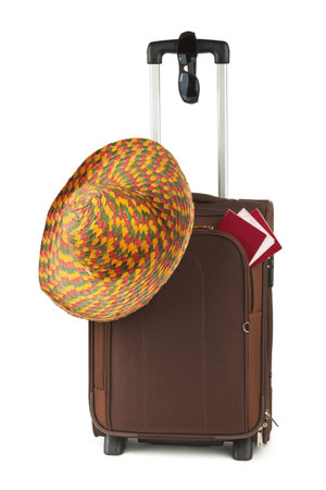 Travel case, hat and sunglasses isolated on white backgroundの写真素材