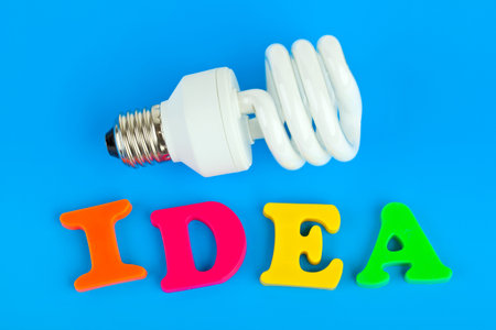 Lamp and word Idea on blue backgroundの写真素材